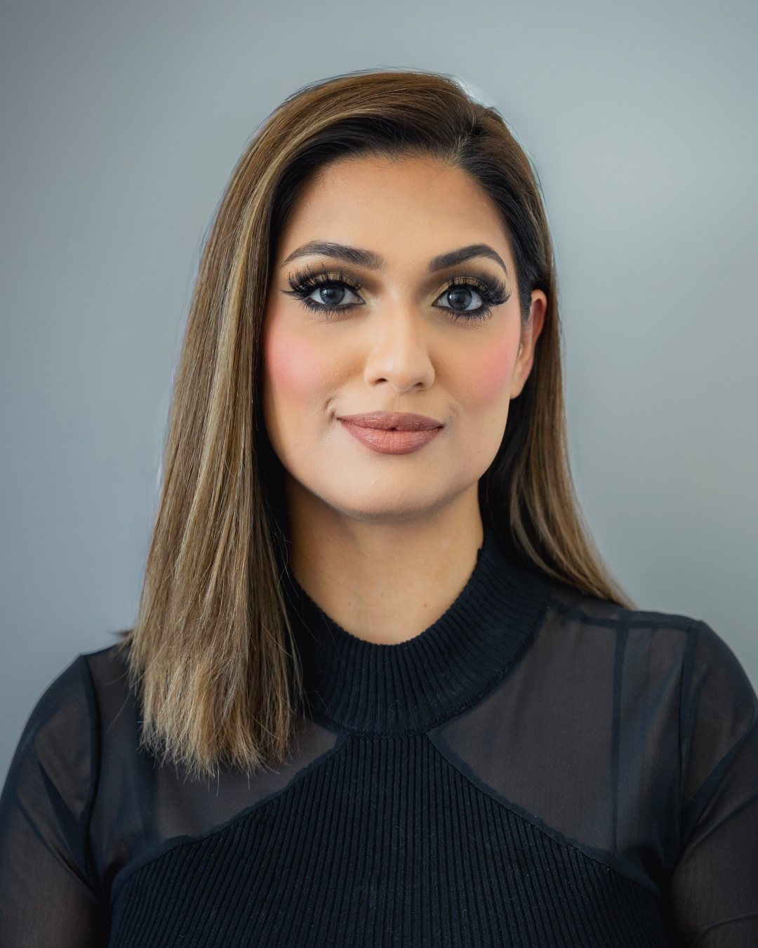 Brand portrait of a makeup artist, direct to camera
